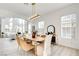 Bright dining room with a light and airy feel, hardwood floors and a view of living room at 5737 Heather Breeze Ct, Las Vegas, NV 89141