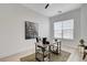 Bright home office features wood desk, window, and area rug at 5737 Heather Breeze Ct, Las Vegas, NV 89141