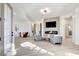 Bright and airy living room featuring a modern fireplace and comfortable seating at 5737 Heather Breeze Ct, Las Vegas, NV 89141