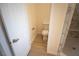 Bathroom with a toilet near an elegant, marble tiled shower at 5821 Genoa Ave, Pahrump, NV 89060