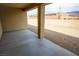 Spacious covered patio providing an outdoor living area with views of the surrounding landscape at 5821 Genoa Ave, Pahrump, NV 89060