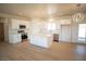 Modern kitchen featuring white cabinets, stainless steel appliances, and a central island at 5821 Genoa Ave, Pahrump, NV 89060