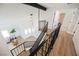 Modern staircase with black metal railing and hardwood floors at 602 Calcutta Ln, Henderson, NV 89015