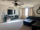 Bonus room with sectional sofa and large TV at 6059 Thistle Meadow Ave, Las Vegas, NV 89139