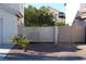 Property features a gated backyard with decorative fencing at 6113 Breeders Cup St, Las Vegas, NV 89130