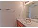 Compact bathroom with single sink vanity and ample countertop space at 6113 Breeders Cup St, Las Vegas, NV 89130