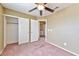 Bedroom featuring closet and view of the laundry room at 6113 Breeders Cup St, Las Vegas, NV 89130