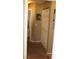 Bright hallway with neutral walls and carpet at 6113 Breeders Cup St, Las Vegas, NV 89130