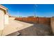 Private backyard with a large concrete patio and block wall at 6230 Home Haven St, North Las Vegas, NV 89031