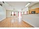 Open kitchen with a breakfast bar and light wood cabinets at 6230 Home Haven St, North Las Vegas, NV 89031