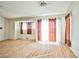 Bright living room featuring hardwood floors and sliding glass doors at 6230 Home Haven St, North Las Vegas, NV 89031