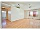 Living room with wood floors and access to bathroom at 6230 Home Haven St, North Las Vegas, NV 89031