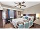 Spacious bedroom with a dresser and a queen-size bed at 6233 Morning Splendor Way, Las Vegas, NV 89110