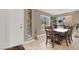 Dining area with a wooden table and chairs near entryway at 6233 Morning Splendor Way, Las Vegas, NV 89110