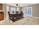 Bright dining room featuring a large table and access to the kitchen at 6233 Morning Splendor Way, Las Vegas, NV 89110