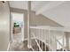 Upstairs hallway with view into a bedroom at 6233 Morning Splendor Way, Las Vegas, NV 89110