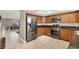 Modern kitchen features stainless steel appliances and ample cabinetry at 6233 Morning Splendor Way, Las Vegas, NV 89110