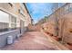 Brick paved backyard with seating area and grill at 6255 W Arby Ave # 218, Las Vegas, NV 89118