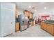 Spacious kitchen with stainless steel appliances and light wood cabinets at 6255 W Arby Ave # 218, Las Vegas, NV 89118