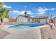 Inviting backyard oasis featuring a sparkling pool, spacious patio, and storage shed at 6436 Whippoorwill Way, Las Vegas, NV 89103