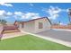 Backyard view showing a pool and side yard with raised garden bed at 6436 Whippoorwill Way, Las Vegas, NV 89103