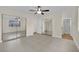 Bright bedroom with mirrored closet doors and ceiling fan at 6436 Whippoorwill Way, Las Vegas, NV 89103