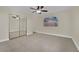 Bedroom with mirrored closet doors and a window with blinds at 6436 Whippoorwill Way, Las Vegas, NV 89103