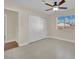 Well-lit bedroom featuring tile floors and large closet at 6436 Whippoorwill Way, Las Vegas, NV 89103