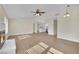 Spacious living room with hardwood floors, a fireplace, and lots of natural light at 6436 Whippoorwill Way, Las Vegas, NV 89103