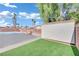 Backyard with swimming pool, shed and artificial turf at 6436 Whippoorwill Way, Las Vegas, NV 89103