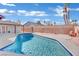 Sparkling blue pool in a sunny backyard setting at 6436 Whippoorwill Way, Las Vegas, NV 89103