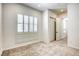 Bright bedroom with plush carpeting and plantation shutters at 650 Sentinel Spire St, Las Vegas, NV 89138