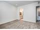 Bright bedroom with carpeted floors and an ensuite bathroom at 650 Sentinel Spire St, Las Vegas, NV 89138