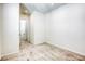 Well-lit bedroom with carpeted floors and an adjacent hallway at 650 Sentinel Spire St, Las Vegas, NV 89138