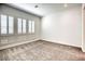 Well-lit bedroom with plantation shutters and carpeting at 650 Sentinel Spire St, Las Vegas, NV 89138