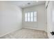 Bright bedroom with neutral walls, plush carpeting, and window shutters at 650 Sentinel Spire St, Las Vegas, NV 89138