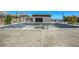 Empty community pool with surrounding decking at 650 Sentinel Spire St, Las Vegas, NV 89138