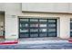 Modern garage with black framed glass panels at 650 Sentinel Spire St, Las Vegas, NV 89138