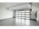 Bright garage with epoxy flooring and modern overhead door at 650 Sentinel Spire St, Las Vegas, NV 89138