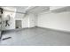 Clean and spacious garage featuring epoxy flooring and storage at 650 Sentinel Spire St, Las Vegas, NV 89138