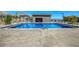 Community pool with surrounding concrete deck and landscaping at 650 Sentinel Spire St, Las Vegas, NV 89138