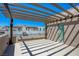 Rooftop deck with pergola, offering views of neighboring homes and mountains at 650 Sentinel Spire St, Las Vegas, NV 89138