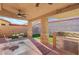 Relaxing covered patio with outdoor kitchen at 6819 Rolling Boulder St, Las Vegas, NV 89149