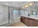 Elegant bathroom with double vanity, soaking tub, and shower at 6819 Rolling Boulder St, Las Vegas, NV 89149