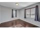 Simple bedroom with hardwood floors and neutral wall colors at 6819 Rolling Boulder St, Las Vegas, NV 89149