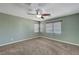 Bedroom with ceiling fan and neutral walls at 6819 Rolling Boulder St, Las Vegas, NV 89149