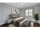 Bright bedroom with wood floors and neutral walls at 6819 Rolling Boulder St, Las Vegas, NV 89149