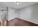 Bedroom with wood floors, a closet and access to the hallway at 6819 Rolling Boulder St, Las Vegas, NV 89149