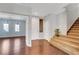 Bright entryway with hardwood floors and staircase at 6819 Rolling Boulder St, Las Vegas, NV 89149