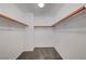 Large walk-in closet with double hanging rods at 6819 Rolling Boulder St, Las Vegas, NV 89149